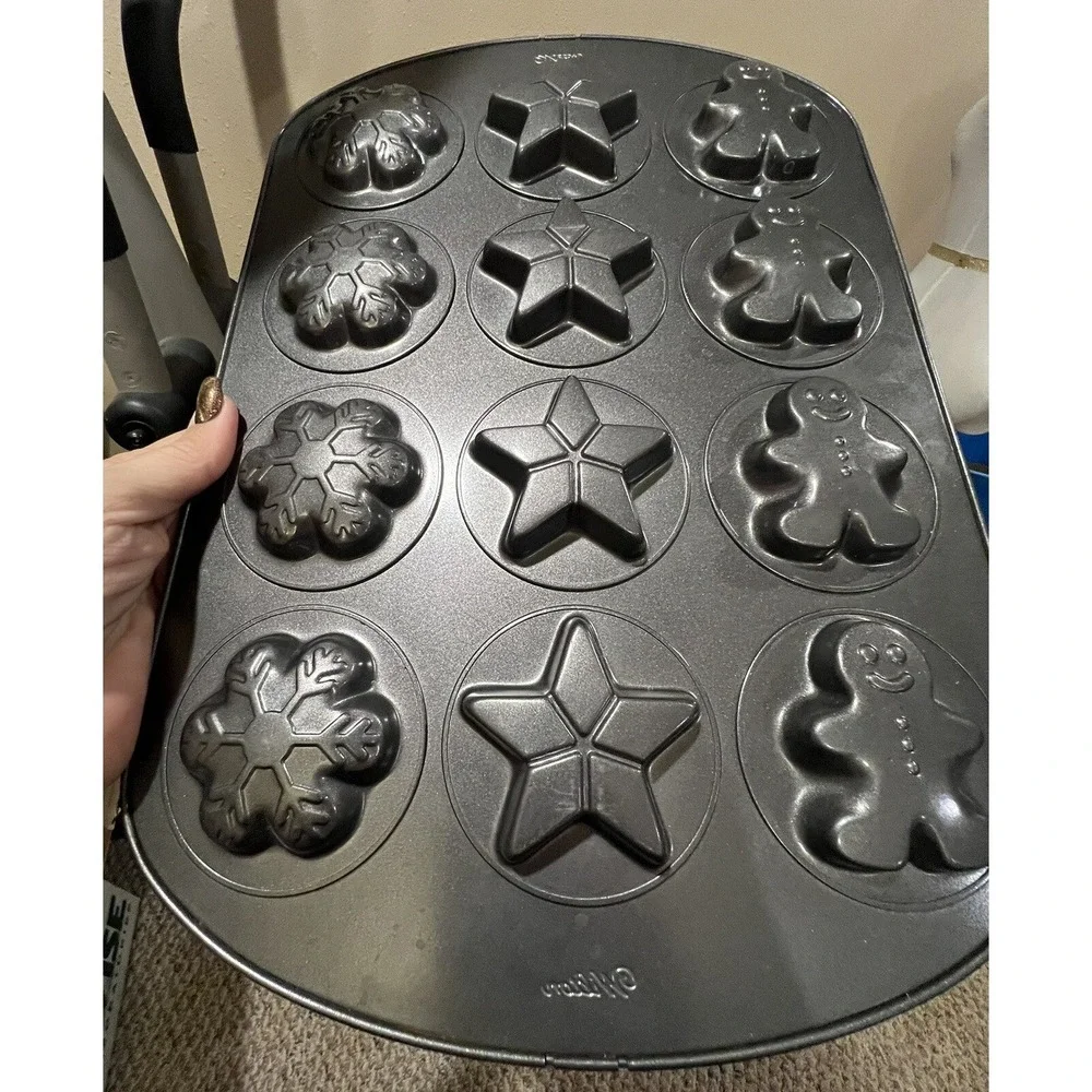 Wilton Cookie Gingerbread Man, Star, and Snowflake‎ Mold Pan